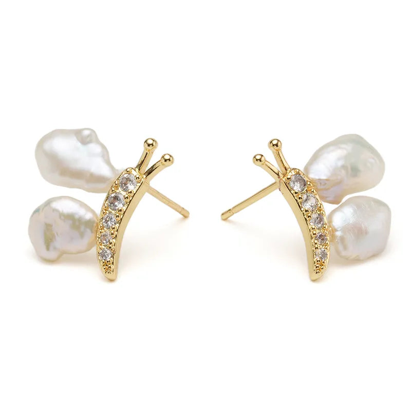 Elegant Baroque Pearl Stud Earrings with Gold Sculptural Butterfly