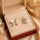 Elegant Baroque Pearl Stud Earrings with Gold Sculptural Butterfly