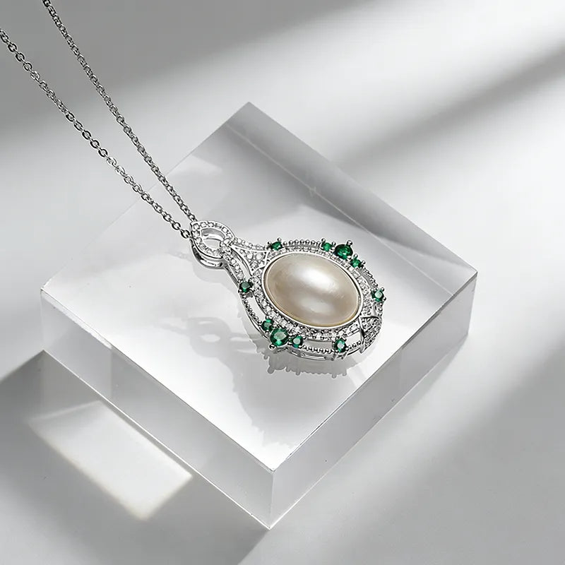 Emerald Halo Pearl Pendant Necklace