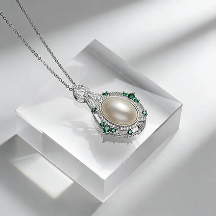 Emerald Halo Pearl Pendant Necklace