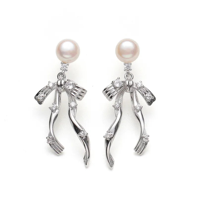 Sculptural Pearl Bow Drop Earrings