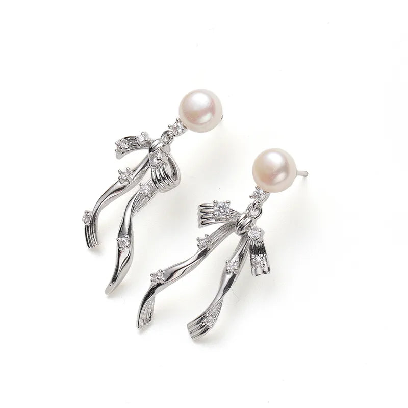 Sculptural Pearl Bow Drop Earrings