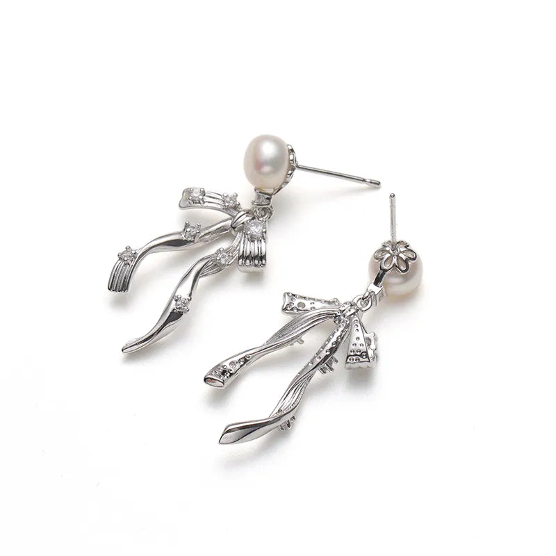 Sculptural Pearl Bow Drop Earrings