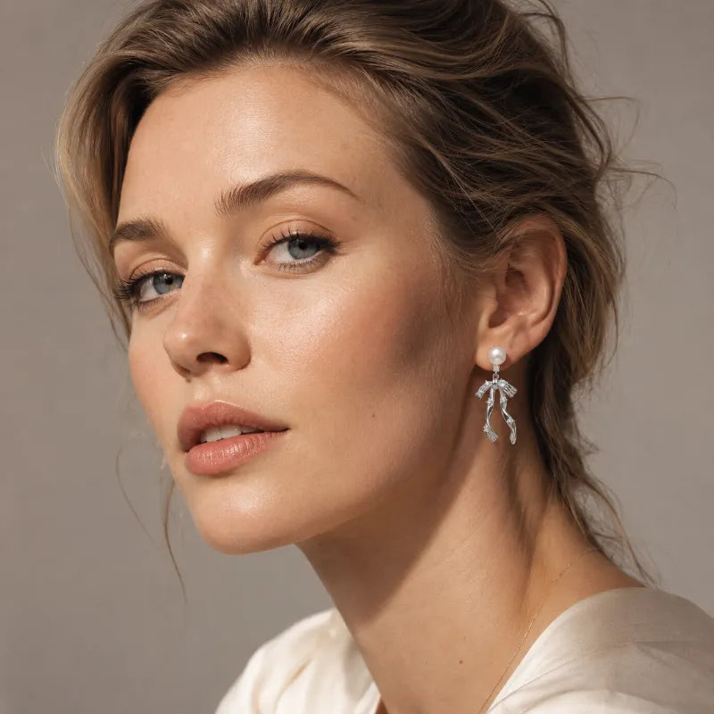 Sculptural Pearl Bow Drop Earrings