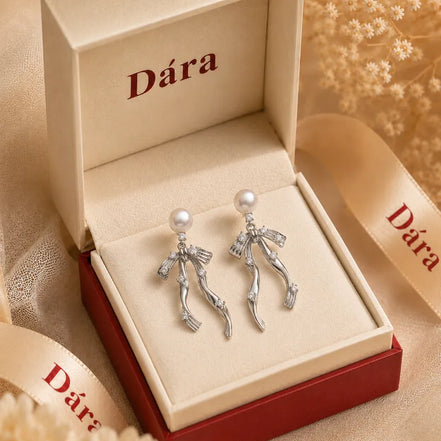 Sculptural Pearl Bow Drop Earrings
